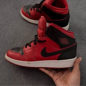 Red and Black High-Top Sneakers Jordan’s